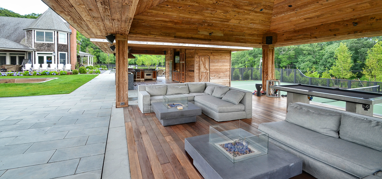 Luxury Outdoor Living Space with Kitchen and Seating