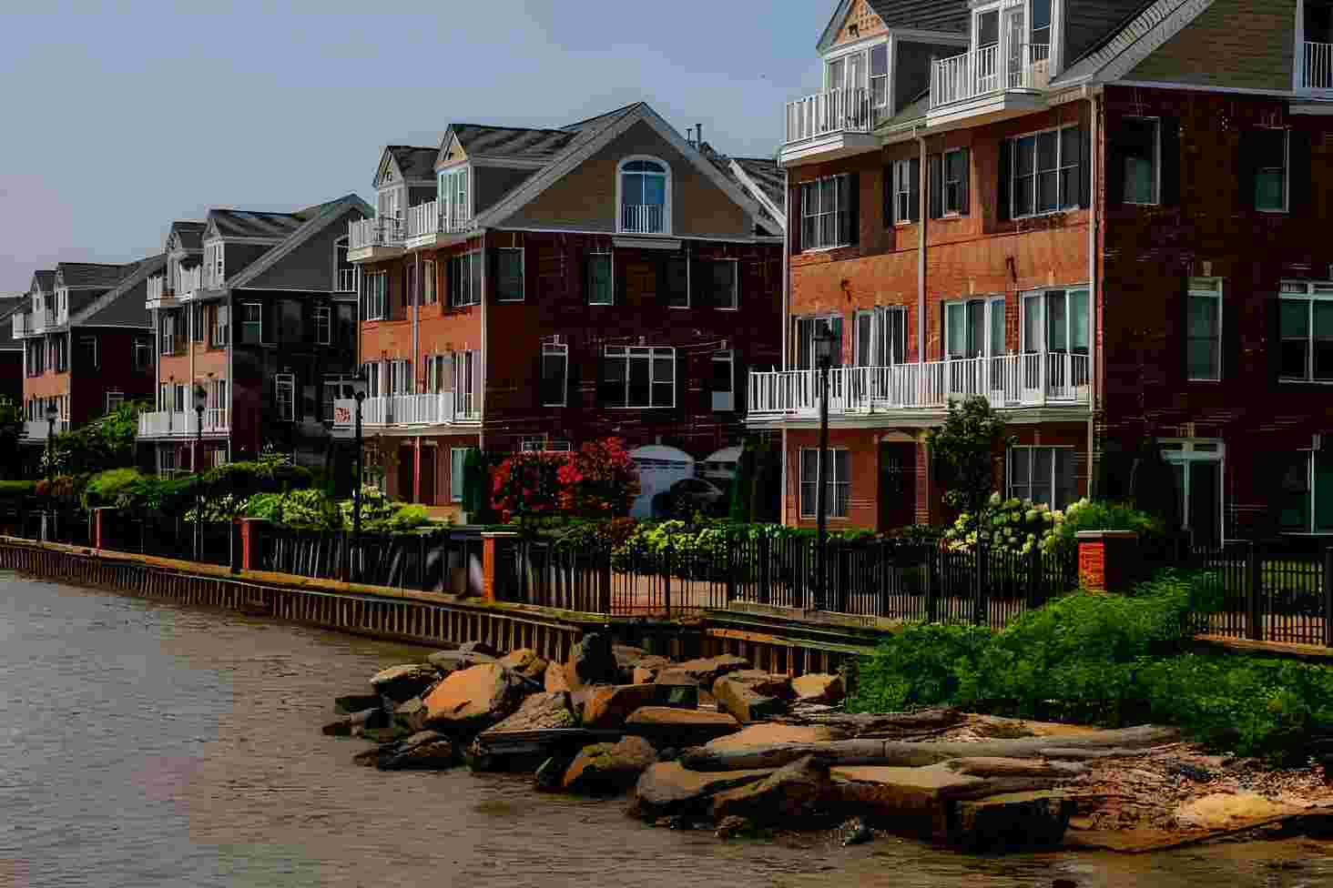 Beautifully landscaped homes in an HOA neighborhood look aesthetically pleasing in their uniform appearance