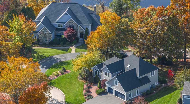 Aerial view of landscaped neighborhood during fall