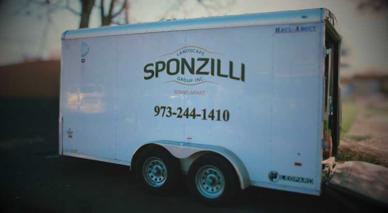 Sponzilli equipment trailer that features their logo