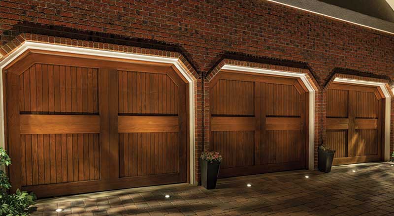 Driveway and garage doors showing the lighting technique of cross lighting