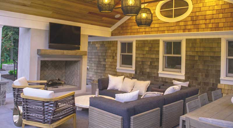Inviting outdoor living room with plush sectional seating.