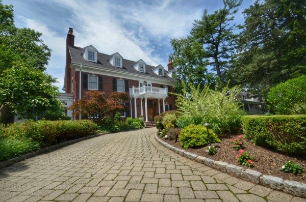 Driveway with Belgium Block Curbing Leads to Nice Brick Home