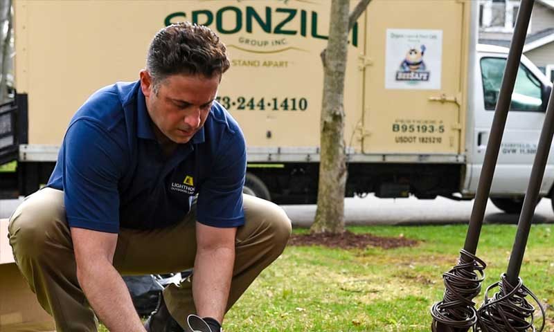 Lightin-Technician, lighting technician installing outdoor lighting