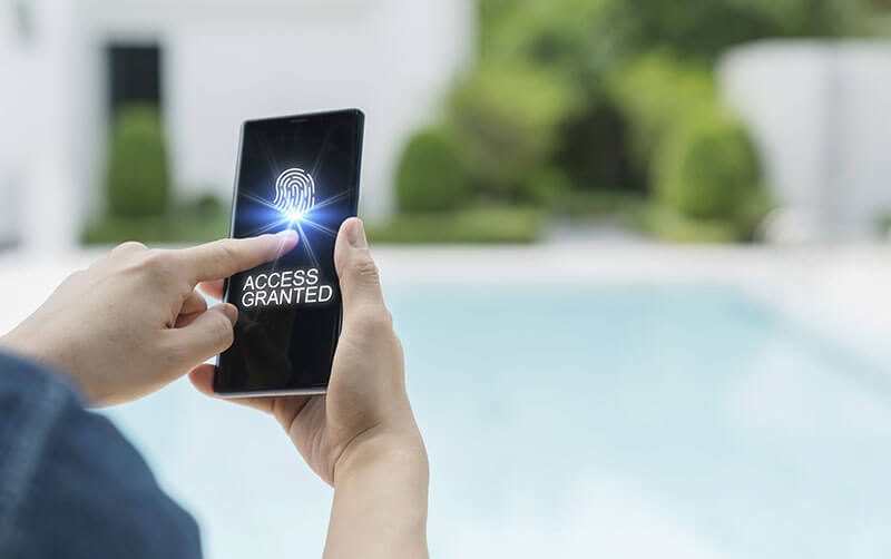 Smartphone apps to control outdoor lighting, pools and spas is a new landscaping trend