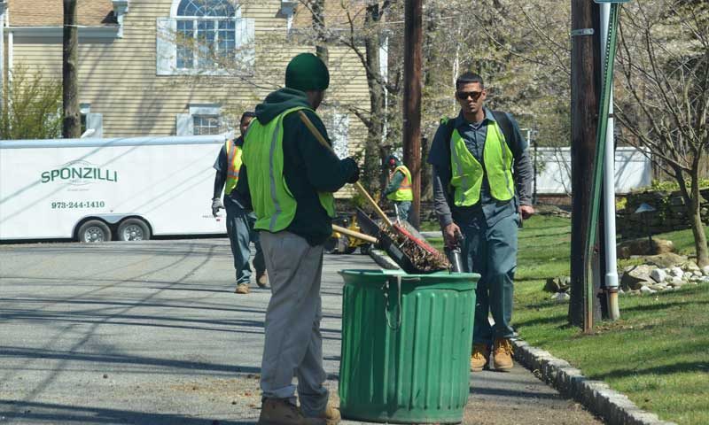 Landscapers doing seasonal cleanup