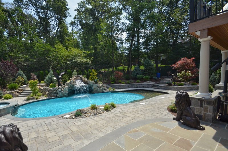SWimming Pool with Waterfall and Landscaping