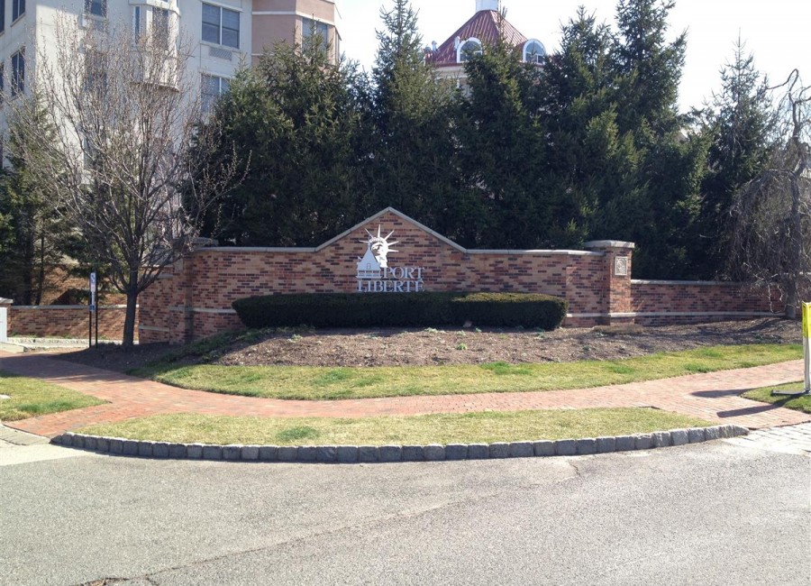 Porte Liberty Entrance - Before Landscaping Porte Liberte Entrance Sign