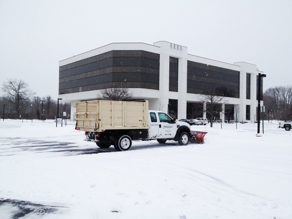 Snow Plowing a Corporate Parking Lot
