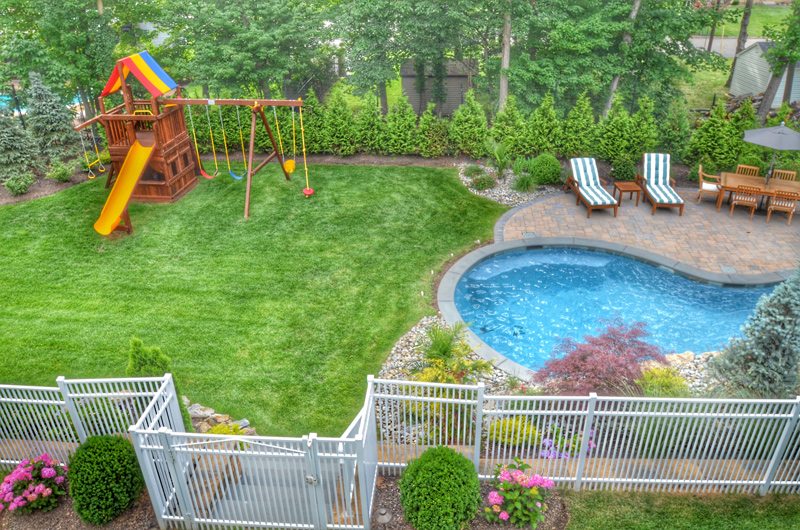 Swimming Pool and Swingset Play Space for Kids